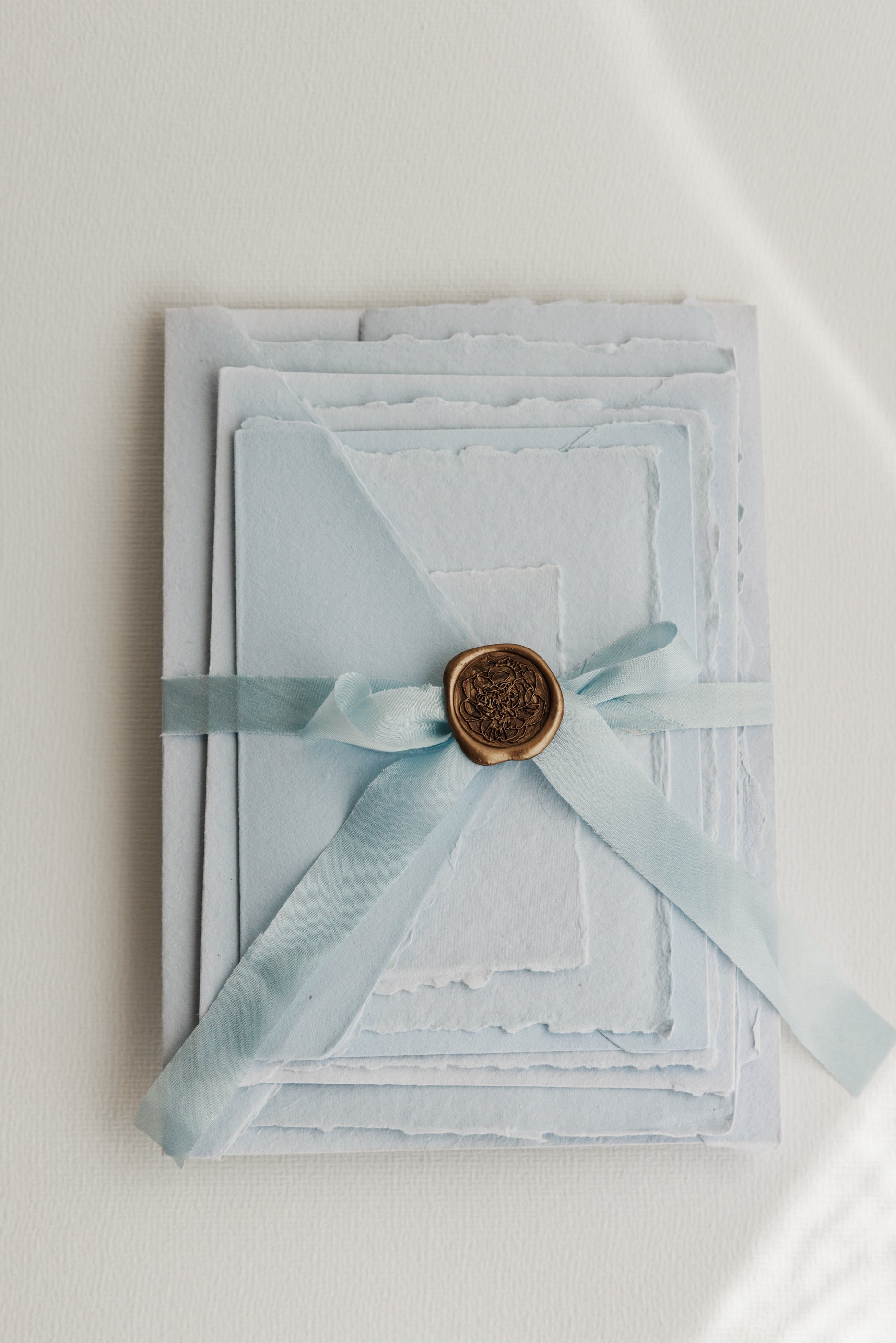 Powder Blue cotton rag paper and matching envelopes with blue pure silk ribbon