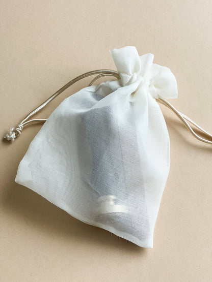 Silk organza favour bag with wax seal stamp inside