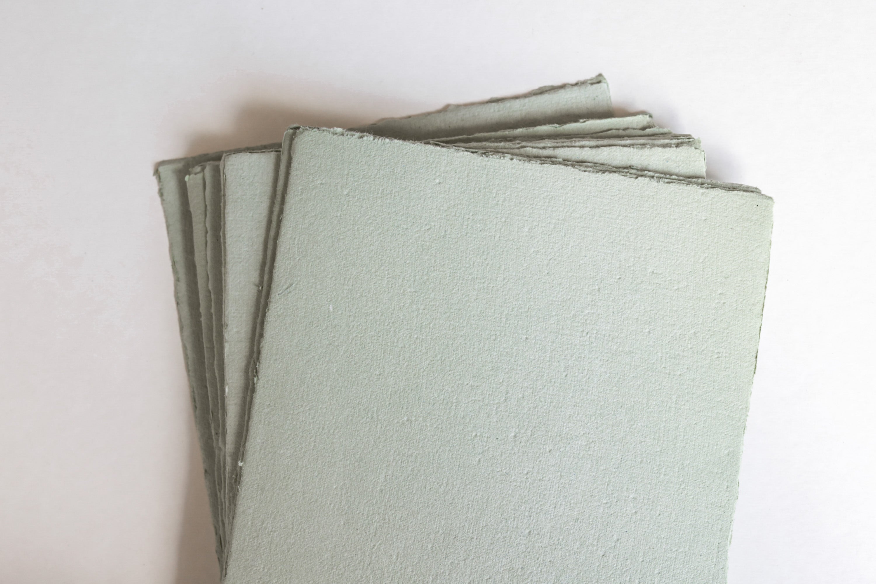 Sage Green Handmade Recycled Paper with an organic torn edge