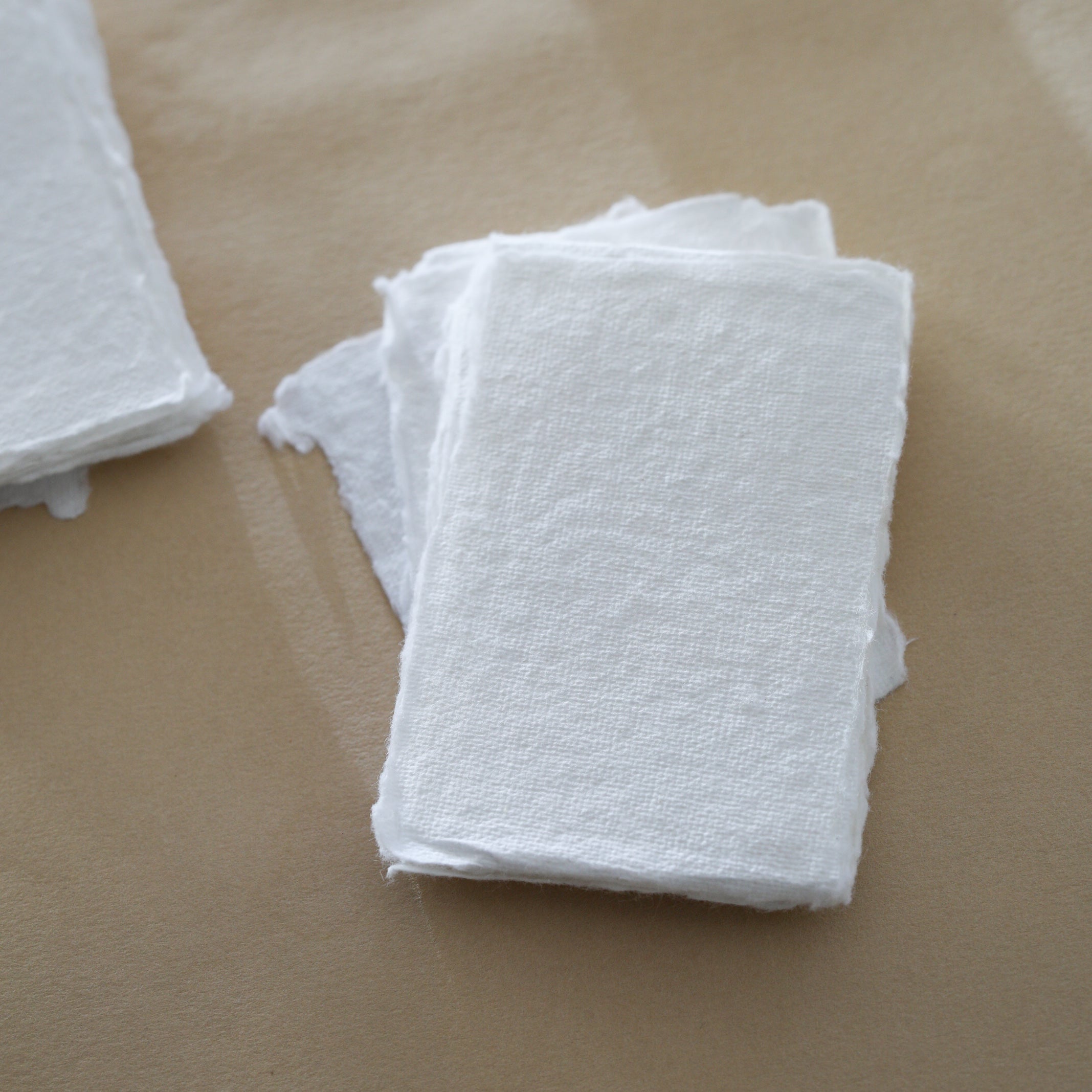  white handmade recycled cotton rag paper place cards with deckle edge